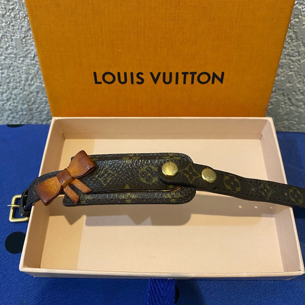 Louis Vuitton Monogram vintage adjustable bracelet with decorative vachetta bow